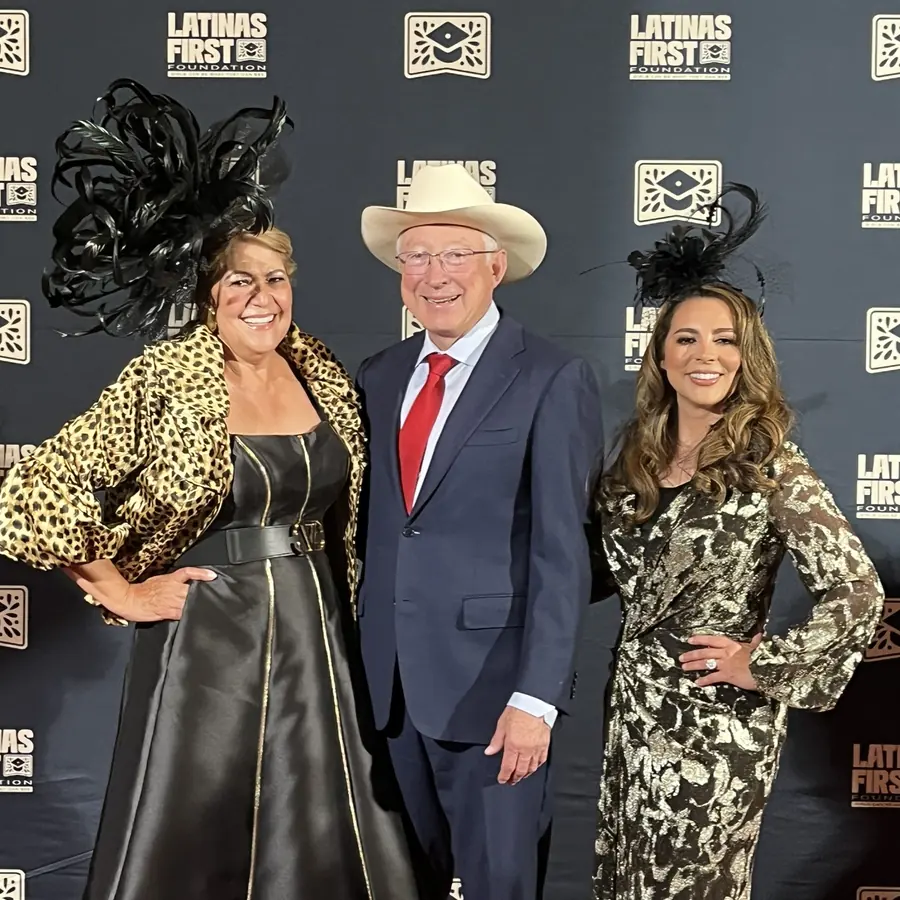 Ken Salazar with two guests at the Latinas First Foundation celebration